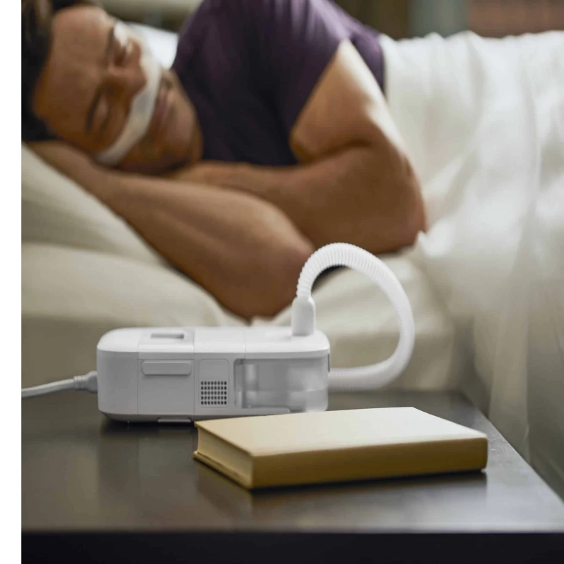 DreamStation Go CPAP humidifier machine during night therapy