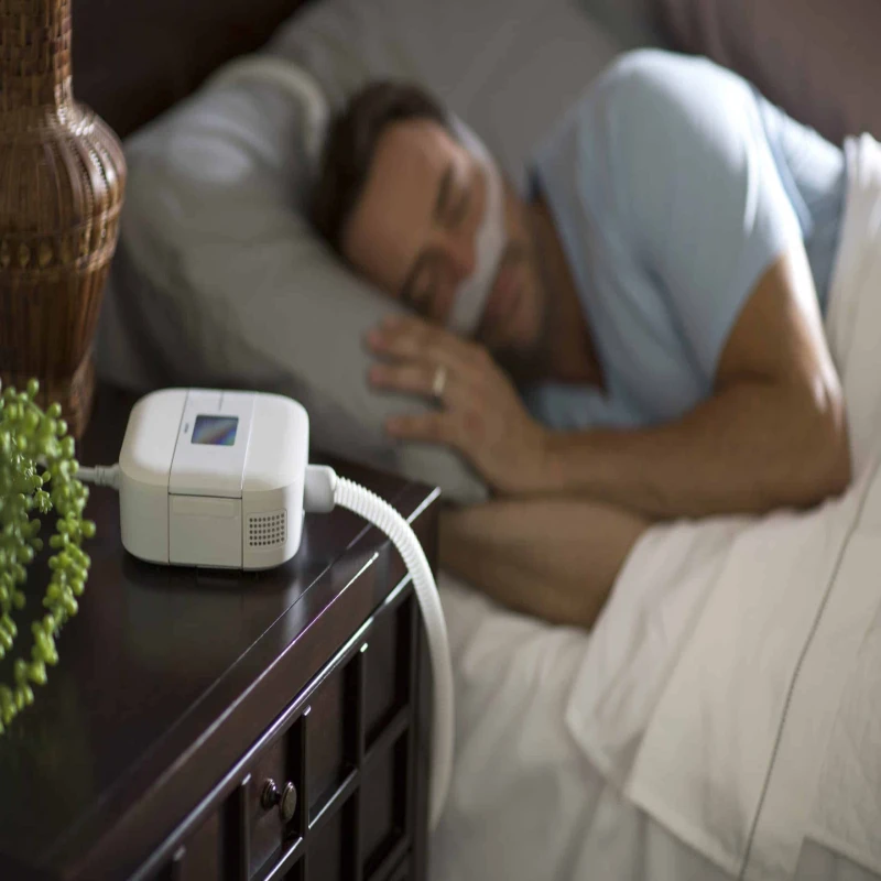 DreamStation Go auto CPAP machine used during night therapy