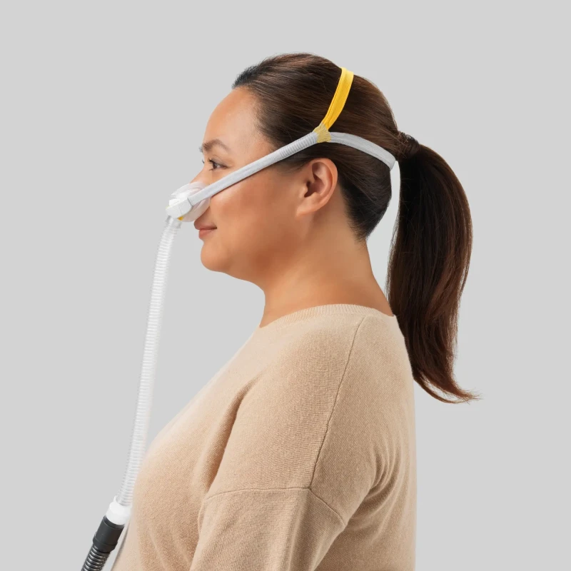 Solo nasal CPAP mask worn by user